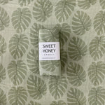 Green Monstera Swaddle Blanket - Sweet Sweet Honey Hawaii