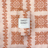 Hibiscus Quilt Peach Swaddle Blanket - Sweet Sweet Honey Hawaii
